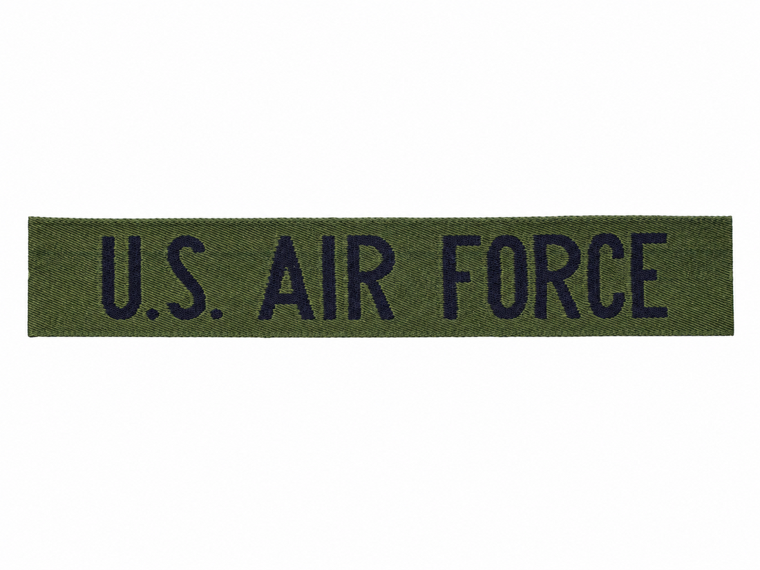 Surplus dell'esercito con stemmi sulla toppa sul petto dell'aeronautica militare americana originale