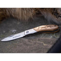 Coltello tascabile BOKER Caveman Steel 440A in acciaio non rivestito con manico in legno decorato
