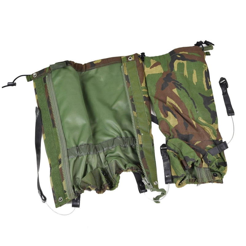 Pair of British army gaiters in DPM woodland camouflage with durable steel wire straps and full-length zippers