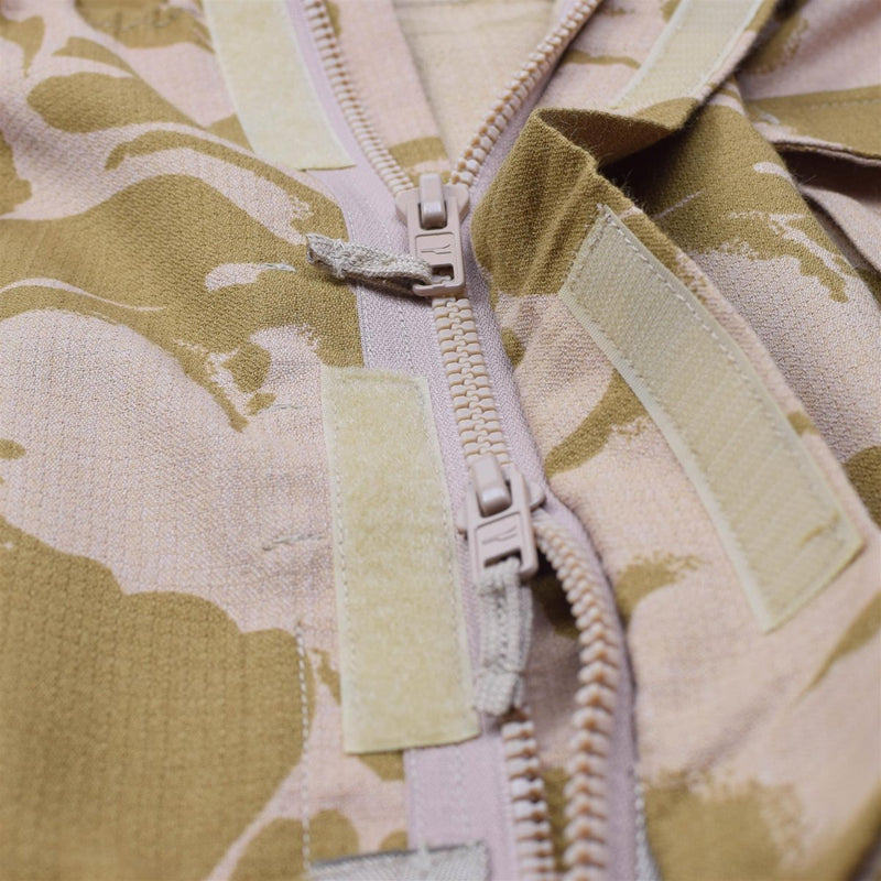 Close-up of zipper and Velcro on a desert camouflage British military flame resistant windproof smock jacket