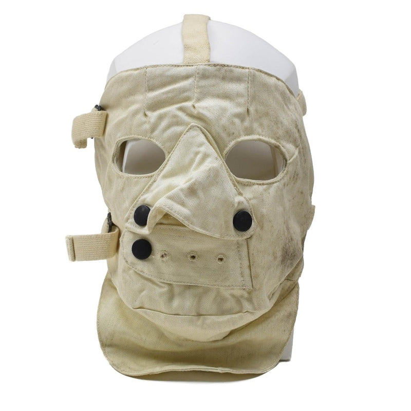 Adjustable creepy white para-aramid cold weather facemask with ventilation and snap button closure for cosplay or warmth.