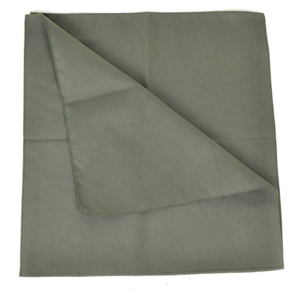 Folded green fabric on a white background