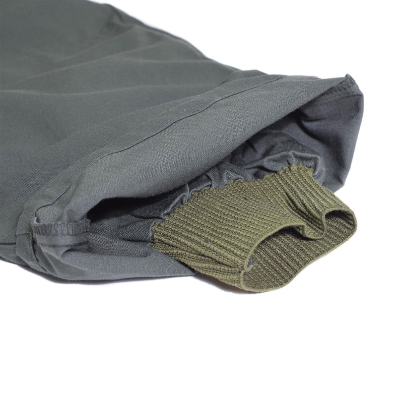 Close-up of sleeve cuff on genuine French military air force cold weather hooded coverall jumpsuit in dark fabric
