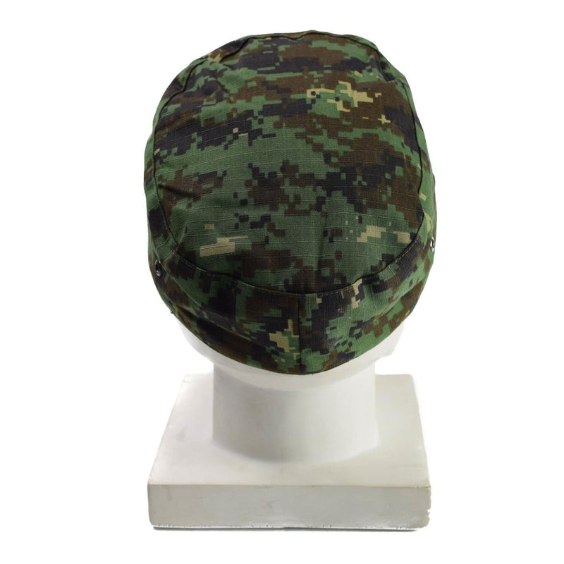 Back view of genuine Guinea Bissau army cap in digital jungle camouflage ripstop fabric on mannequin head