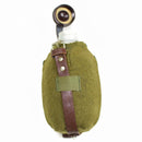 Vintage Romanian army canteen cup with green wool felt cover and leather strap, durable metal water flask like new condition.