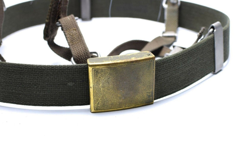 Vintage German army Y-strap suspenders belt in olive green with brass buckle for tactical load distribution
