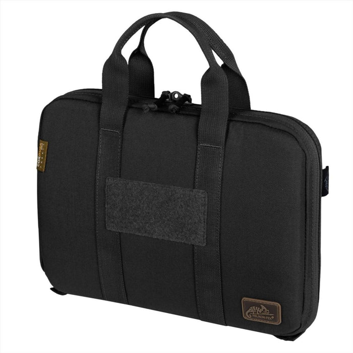 Custodia nera a portafoglio per pistola singola Helikon-Tex realizzata in nylon Cordura con interno imbottito e doppie maniglie per riporre in sicurezza la pistola