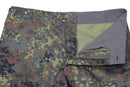 Close-up of Leo Kohler lightweight tactical airsoft pants in Flecktarn camo with button fly and belt loops visible.