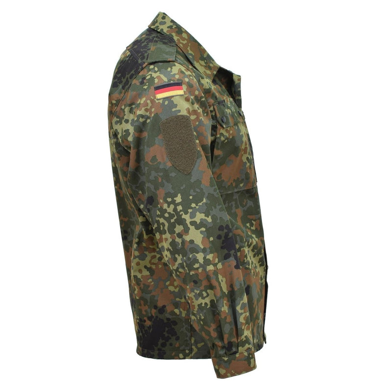 Leo Kohler tactical military shirt in flecktarn camouflage with German flag patch and reinforced stitching detail.