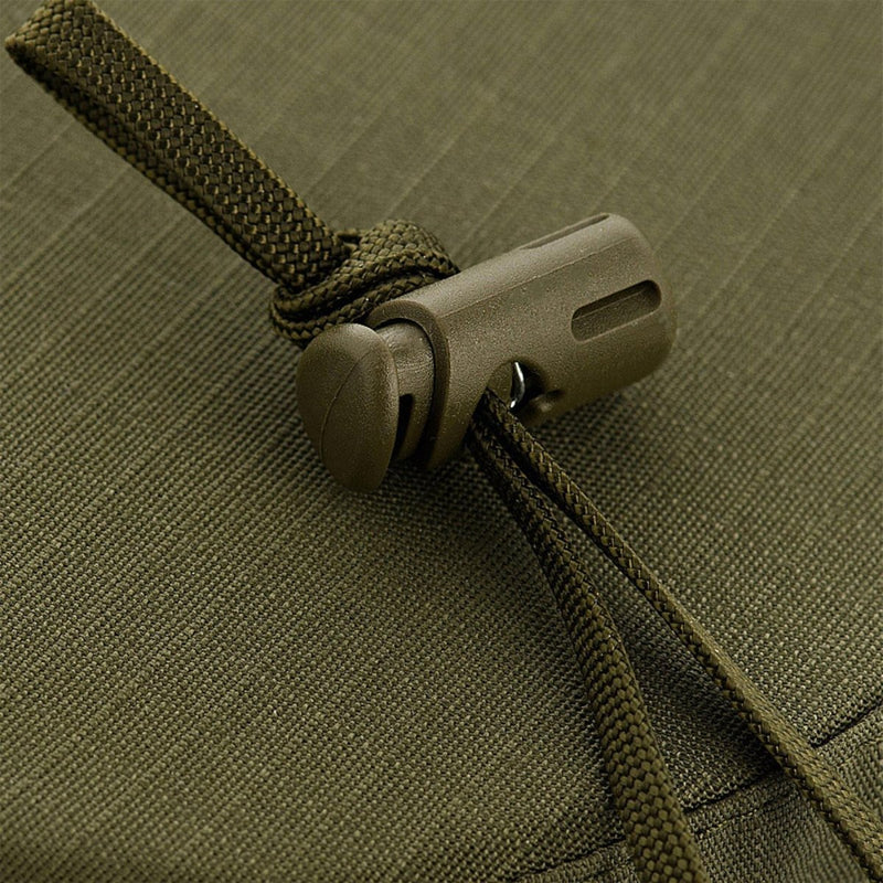Close-up of adjustable olive green cord lock and cord on lightweight tactical boonie hat fabric