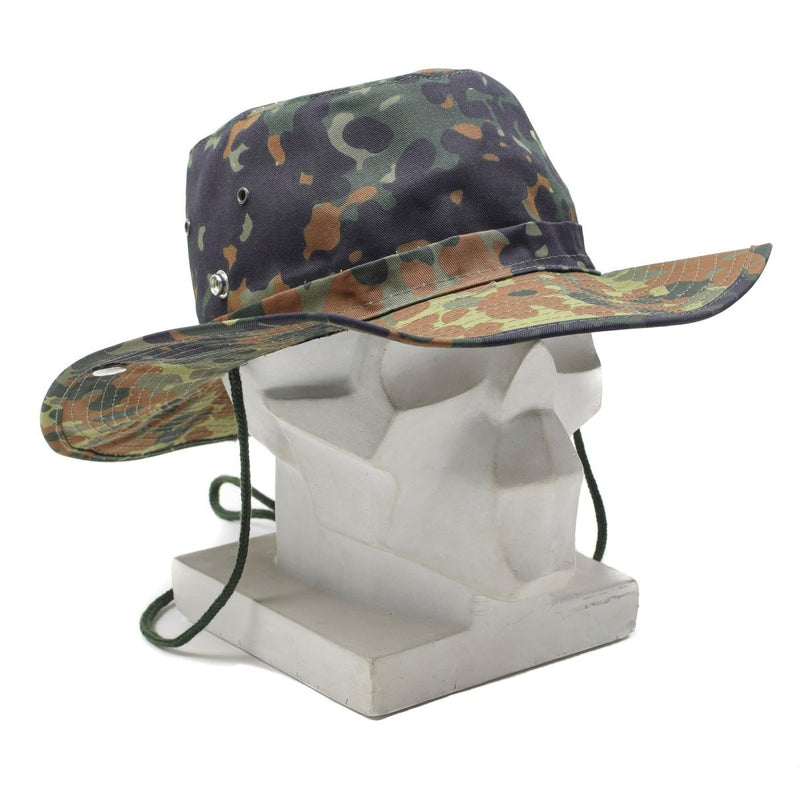 MFH Military bush style hat in flecktarn camo with wide brim and chin strap for outdoor and summer use.