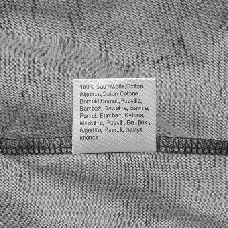 Close-up of a fabric label showing 100% cotton material inside a gray U.S. Army style camo t-shirt.