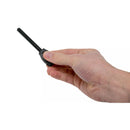 Hand holding MORAKNIV lightweight steel Fire Starter 11859 with black coating for camping and outdoor use