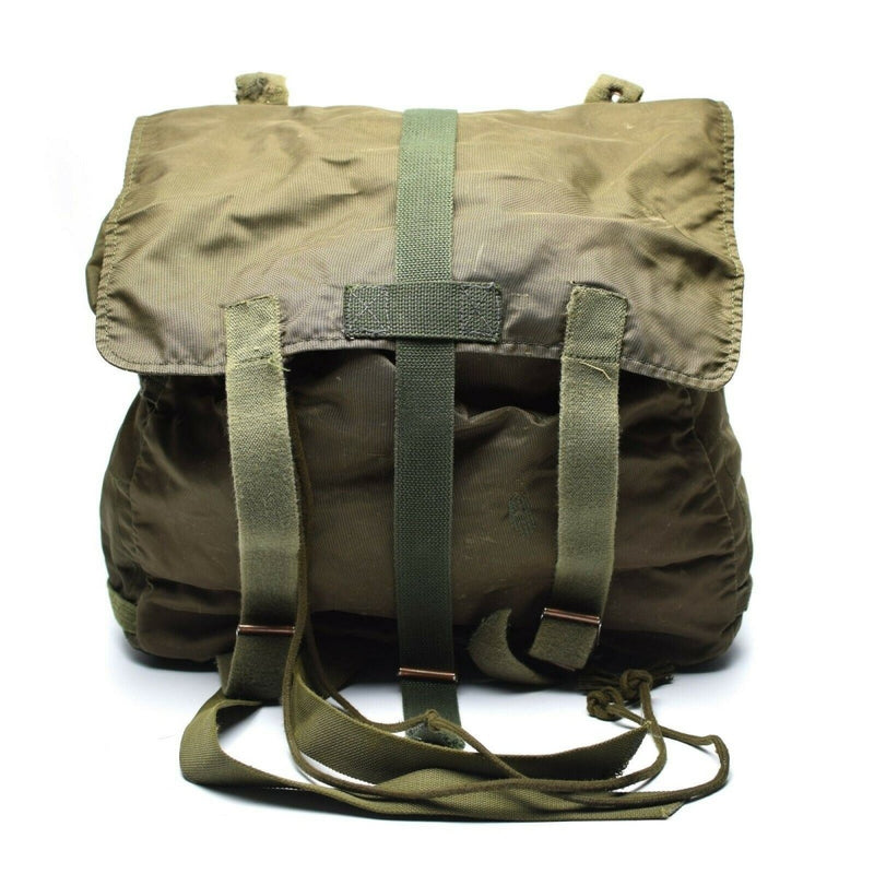 Original Austrian Army olive green vintage combat day pack with buckle closure and adjustable carrying strap.