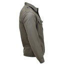 Side view of vintage olive-green Austrian M59 military field jacket with buttoned cuffs and chest pocket