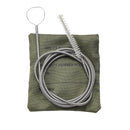 Green cleaning kit with coiled metal brushes on a white background