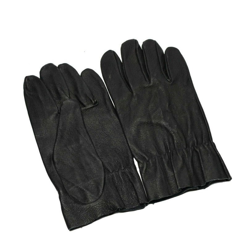 Pair of genuine black leather Original Czech Army combat gloves with elasticated cuffs shown on white background