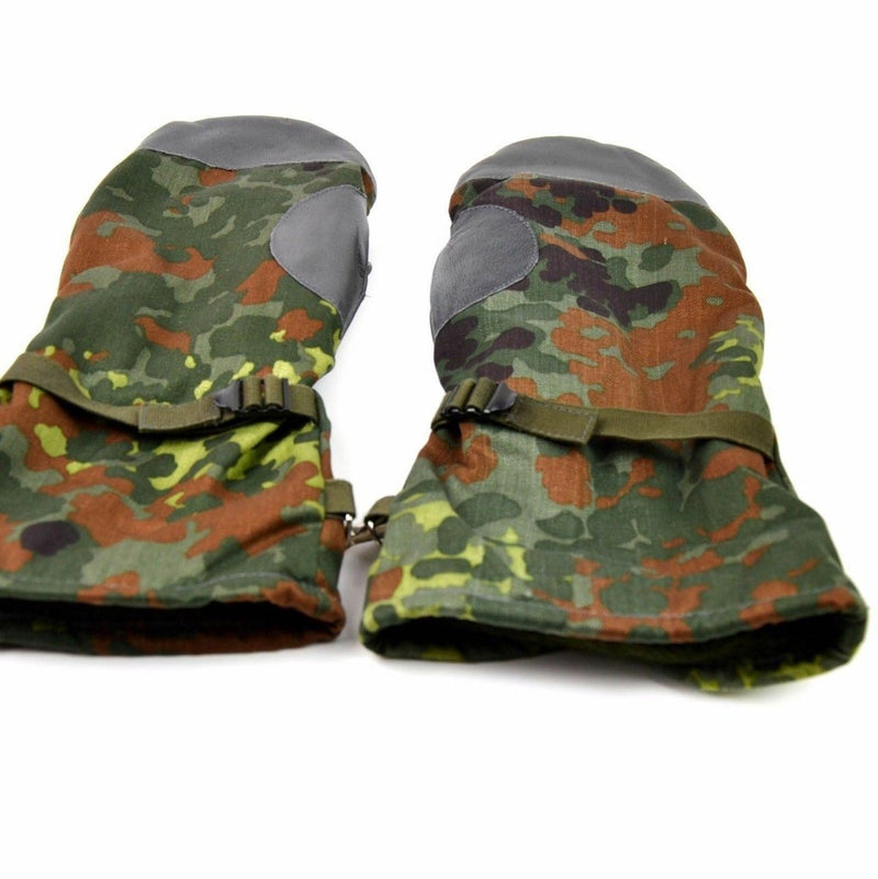 Original German army flecktarn camo mittens with leather grip, fleece lining, and adjustable wrist strap for winter protection.