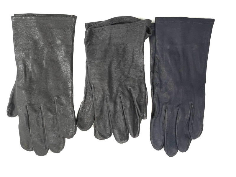 Three pairs of original German army leather gloves in gray and dark shades, military surplus tactical design