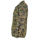 Side view of original US Army digital woodland camo BDU jacket with chest and arm pockets and adjustable cuffs