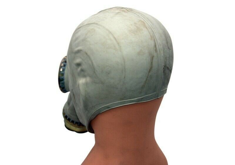 Side view of a vintage 1970s Polish MP3 MUA gas mask with rubber facepiece and front filter canister.