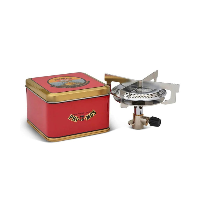 Bruciatore da campeggio Primus ClassicTrail Stove 130 a fiamma larga con robusto design a quattro cialde e contenitore compatto in metallo rosso.