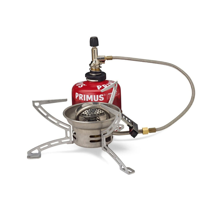 Fornello da campeggio pieghevole compatto Primus EasyFuel Duo a propano e butano con contenitore remoto e gambe pieghevoli per cucinare all'aperto.
