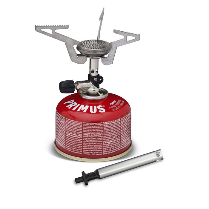 Fornello da trekking compatto Primus Express con bruciatore pieghevole leggero e contenitore per carburante rosso per cucinare all'aperto in modo efficiente.