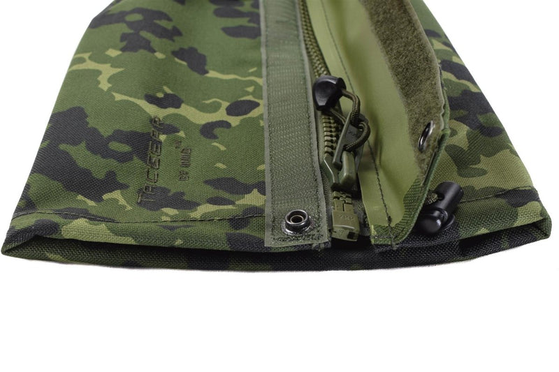 Close-up of TACGEAR waterproof leg gaiter in M84 Danish camo with zipper, drawstring, and metal hooks visible.