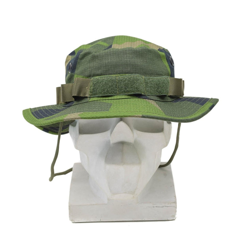 Swedish military style boonie hat in Splinter camo ripstop with wide brim and adjustable chin strap on white mannequin head.